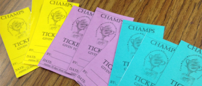 Students receive tickets for good behavior.