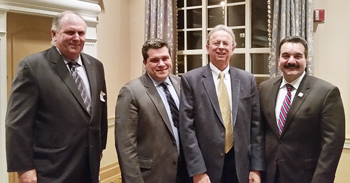 Left to right, at the Hudson County School Boards Association meeting, Dan Sinclair, NJSBA vice president for county activities; Assemblyman Nicholas Chiaravalloti; Dr. Lawrence S. Feinsod, NJSBA executive director; and Assembly Speaker Vincent Prieto.