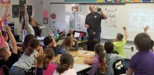 Berkeley Township Police Officer Scott Selby teaches a DARE lesson to a grade 5 class at Berkeley Township Elementary School. A township police officer is in each of the district's four schools every day.