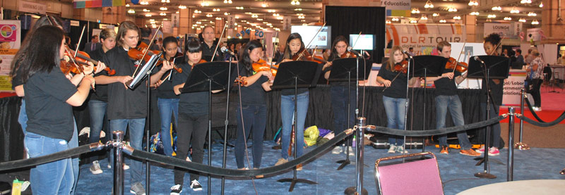 The Hunterdon Central Regional High School Fiddle Club performed on the Exhibit Hall floor.