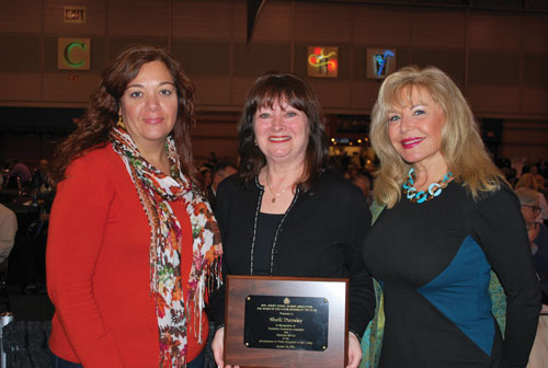 After receiving her Board Member of the Year Award at Workshop, Sheli Dansky (center) with River Edge Board President Paris Myers (left) and Dr. Tova Ben-Dov, superintendent (right).