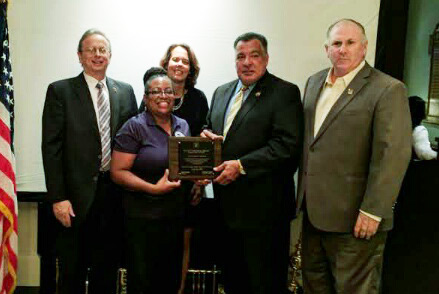 The Newark school board was presented with Carole E. Larsen Master Board Certification, which is awarded by the NJSBA Board Member Academy in recognition of high-performing boards. Pictured (L-R) during presentation of the award at an Essex County School Boards Association meeting are NJSBA Executive Director Dr. Lawrence S. Feinsod; Deborah Thompson-Gaddy, Newark board member; Charlene Peterson, NJSBA field services representative; Tave Padilla, Newark board vice-president; and Daniel T. Sinclair, NJSBA president.