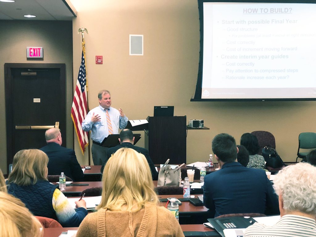 Rob Greitz, NJSBA consultant/negotiator, addresses the group at the Analyzing and Construction Salary Guides program. The program, held at New Jersey Manufacturers Insurance Group headquarters in West Trenton, was attended by board members, attorneys and school business administrators.
