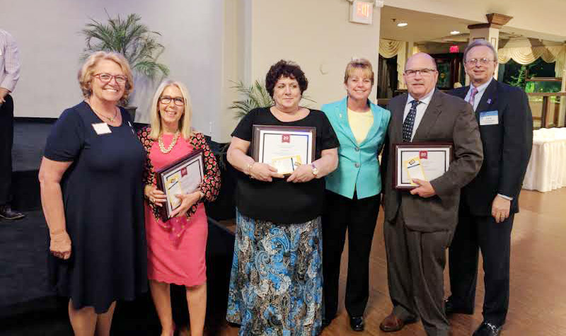 The Camden and Gloucester County School Boards Associations presented milestone awards, and other recognition awards, during a recent joint meeting. Here, members receive 20-year milestone awards, marking their service to local school boards. Pictured (l-r) are Joyce Miller, Camden County School Boards Association president; Hillary Garr, Eastern Camden County Regional; Roseanna Iles, Waterford Township; Ginny Murphy, Gloucester County School Boards Association president; David Piccirillo, Delsea Regional; and Dr. Lawrence S. Feinsod, executive director, New Jersey School Boards Association.